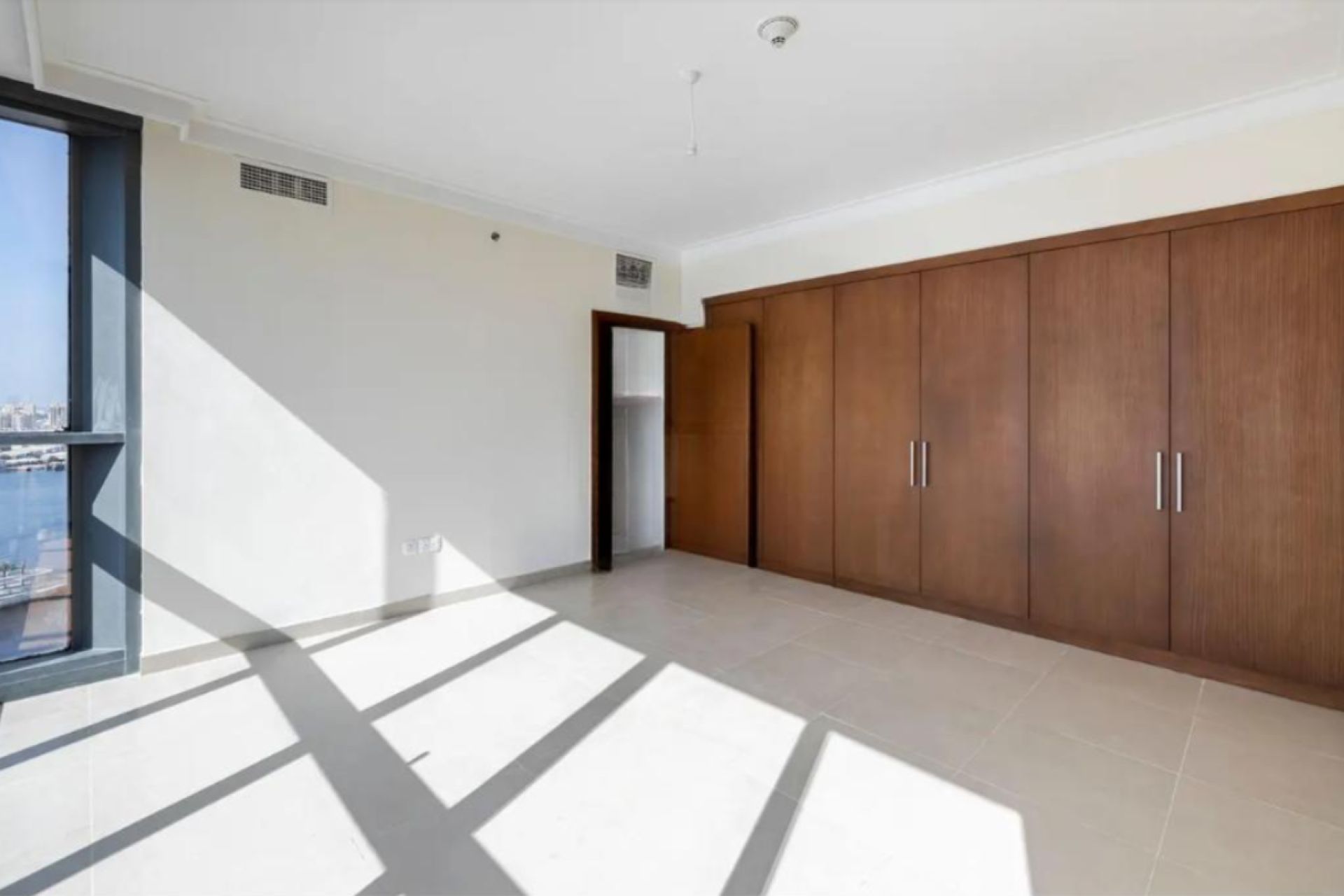 Creek and Marina View | Maids Room | Mid Floor